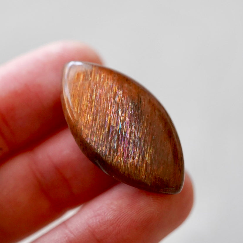 Rainbow 'Meteor Shower' Sunstone Cabochon - 32.5 x 17.5mm (A-W2)