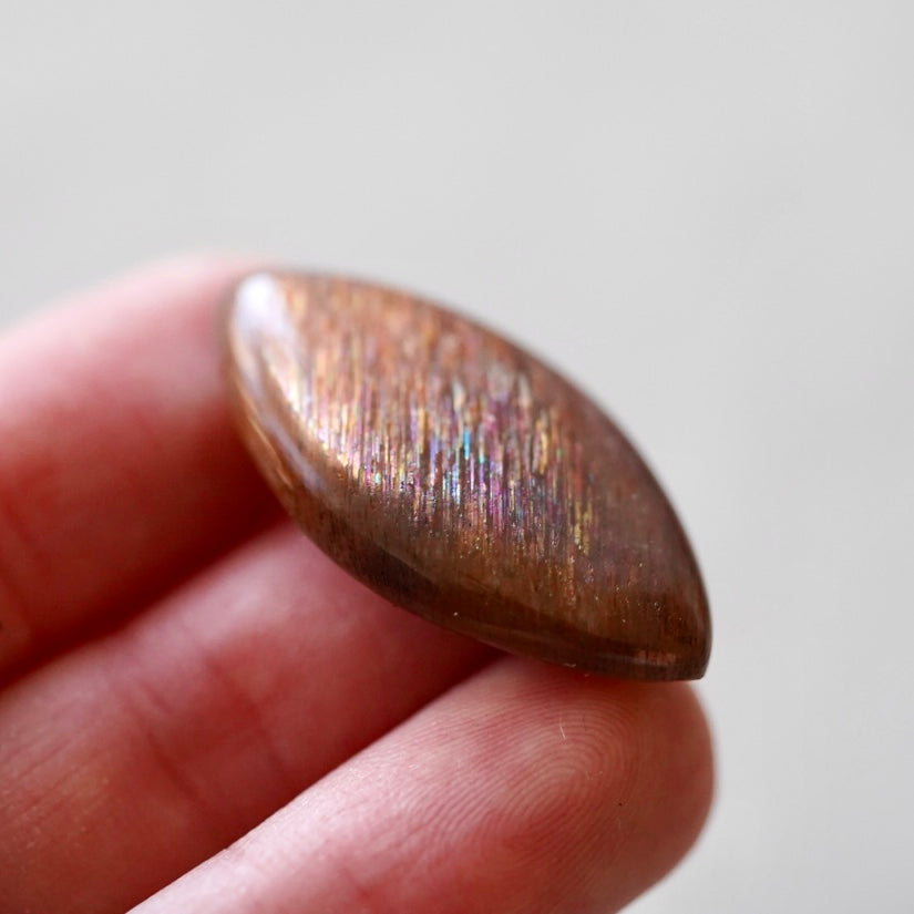Rainbow 'Meteor Shower' Sunstone Cabochon - 32.5 x 17.5mm (A-W2)