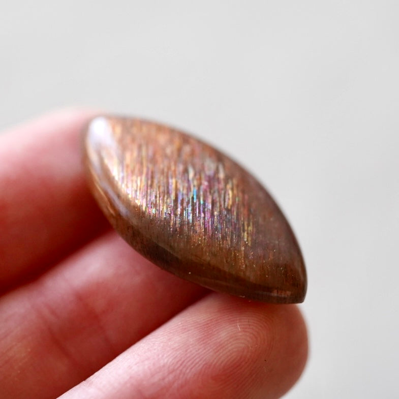 Rainbow 'Meteor Shower' Sunstone Cabochon - 32.5 x 17.5mm (A-W2)