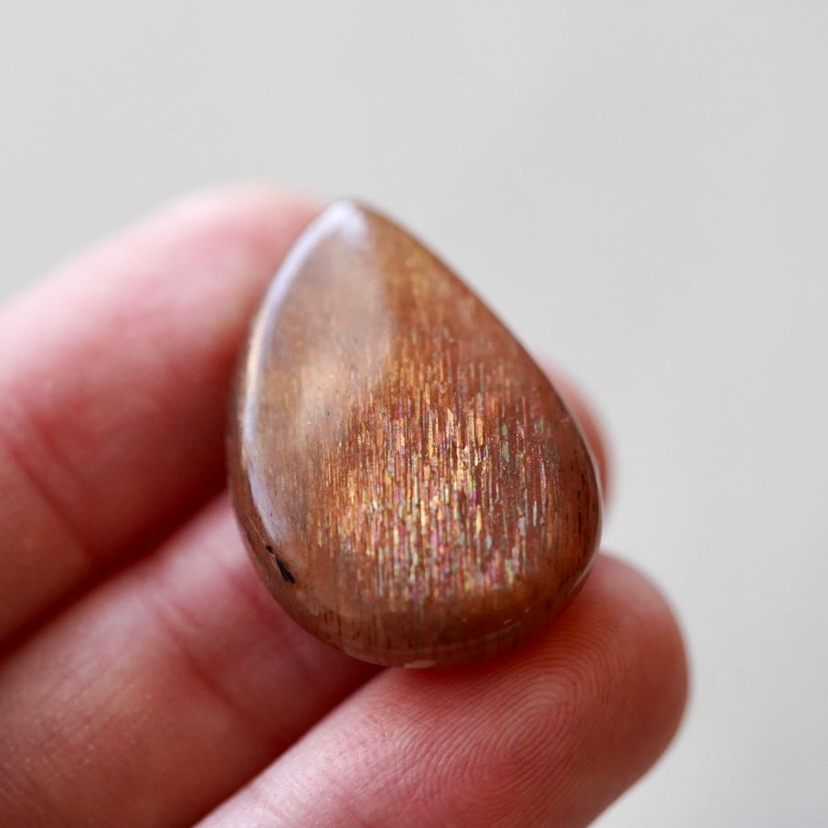 Rainbow 'Meteor Shower' Sunstone Cabochon - 28 x 20mm (C-W2)