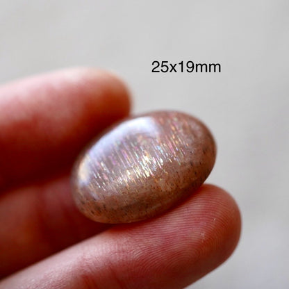 Rainbow 'Meteor Shower' Sunstone Oval Cabochon - 25 x 19mm (D-W2)