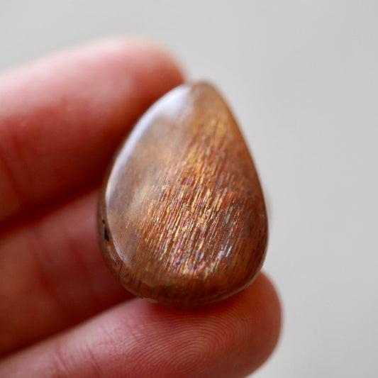 Rainbow 'Meteor Shower' Sunstone Cabochon - 28 x 20mm (C-W2)