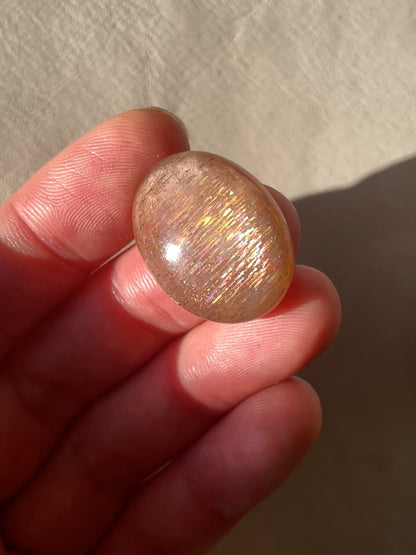 Rainbow 'Meteor Shower' Sunstone Oval Cabochon - 25 x 19mm (D-W2)